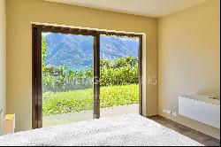 Lugano: completely renovated apartment with private garden & view of Lake Lugano for sale