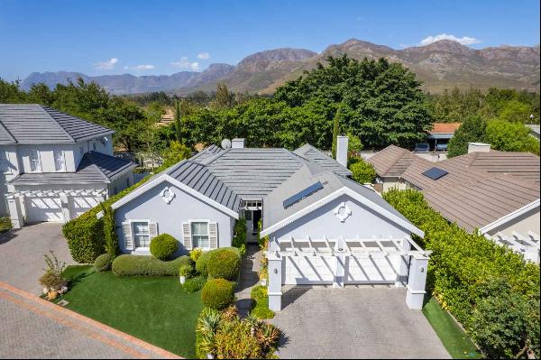 Nestled in the family-friendly The Vines neighbourhood on Val de Vie Estate is a stunning, traditional family home