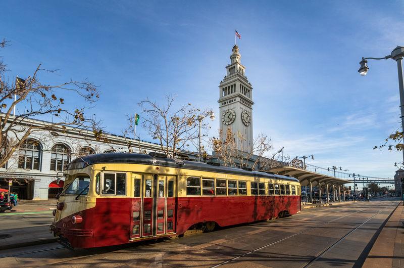 A tram in front of the San Francisco Ferry Building on The Embarcadero