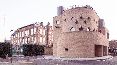 The cylindrical home where the architectural styles of Victorian London and postwar council housing coalesce