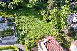 Building plot with Lake Lugano view in prestigious residential area for sale