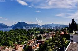 Building plot with Lake Lugano view in prestigious residential area for sale