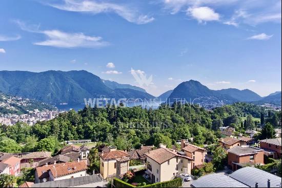 Building plot with Lake Lugano view in prestigious residential area for sale