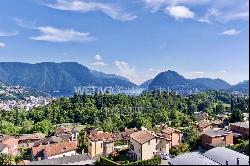 Building plot with Lake Lugano view in prestigious residential area for sale