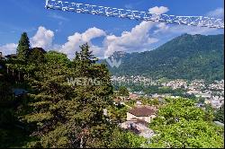 Building plot with Lake Lugano view in prestigious residential area for sale