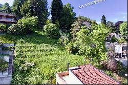 Building plot with Lake Lugano view in prestigious residential area for sale