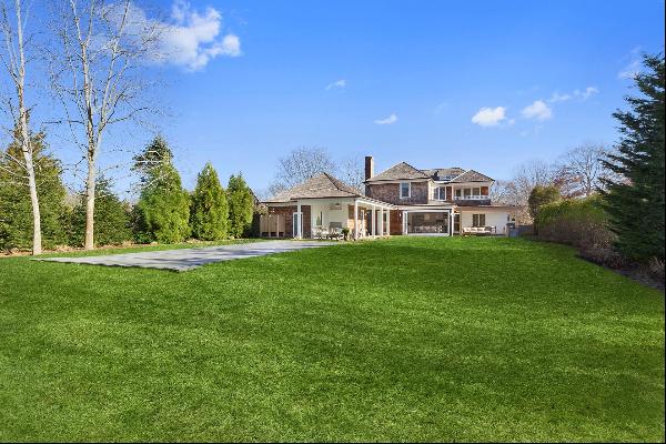  Stunning new construction just off Newtown Lane in East Hampton. six bedrooms (three ensu