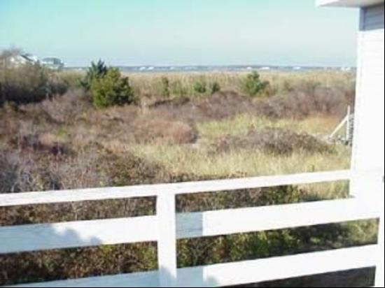 Cute as a button! Dune Road, fully furnished cottage featuring 4 bedrooms, 2 baths, new ki