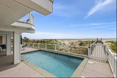 Enjoy your summer in this exquisite oceanfront masterpiece.Updated and thoughtfully appoin