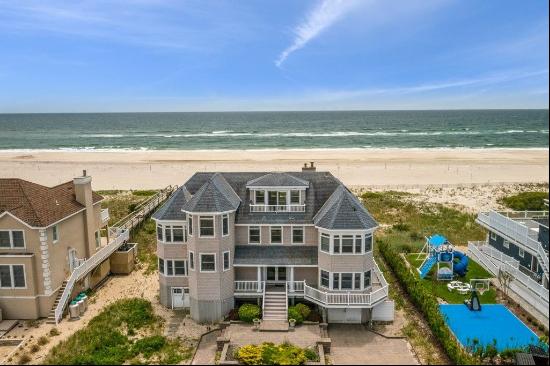 Enjoy your summer in this exquisite oceanfront masterpiece.Updated and thoughtfully appoin