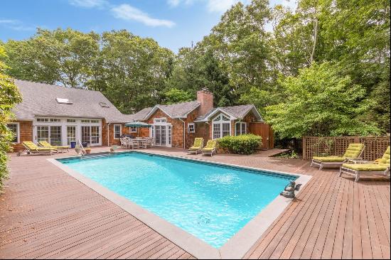 Experience the best of the Hamptons in this private and pristine, south-of-the-highway loc