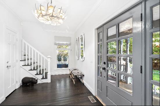 Privately situated on one acre in Northside Hills, this newly renovated, designer's own ho