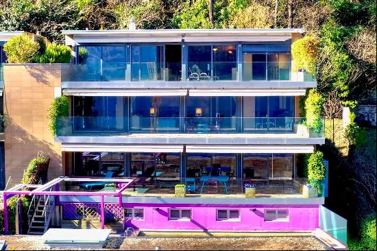 Lugano-Melide: modern penthouse apartment with a magical view of Lake Lugano for sale