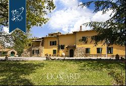 Charming Tuscan agritourism resort with a view of the Val d'Orcia and Mount Amiata