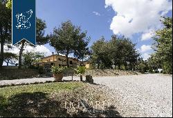 Charming Tuscan agritourism resort with a view of the Val d'Orcia and Mount Amiata