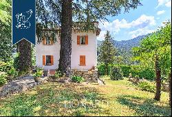 Villa with panoramic turret for sale by Lake Como