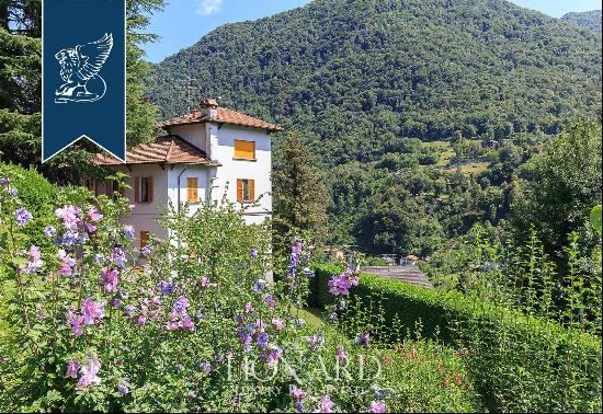 Villa with panoramic turret for sale by Lake Como