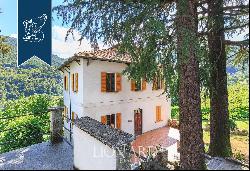 Villa with panoramic turret for sale by Lake Como