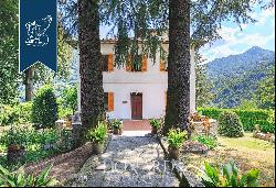 Villa with panoramic turret for sale by Lake Como