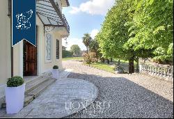 Luxury villa with private garden for sale in Lombardy