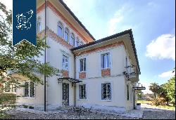 Luxury villa with private garden for sale in Lombardy