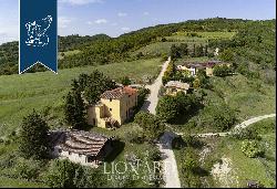 Stunning farmstead with swimming pool for sale in the province of Perugia