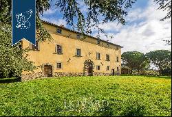 Ancient castle in a panoramic position for sale near Cortona