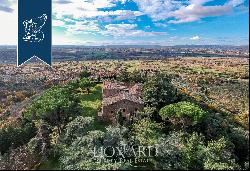 Ancient castle in a panoramic position for sale near Cortona