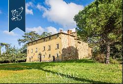 Ancient castle in a panoramic position for sale near Cortona