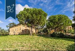 Ancient castle in a panoramic position for sale near Cortona