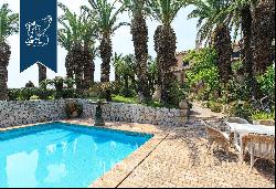 Luxury home with swimming pool and olive grove for sale in Sanremo