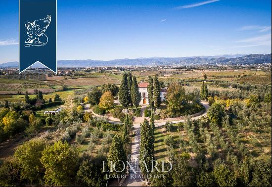 Prestigious estate with an olive grove for sale in the heart of Tuscany