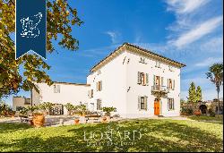 Prestigious estate with an olive grove for sale in the heart of Tuscany