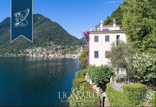 Magnificent villa with private beach and dock for sale on the shores of Lake Como