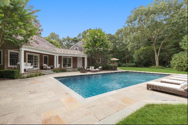 New extensive renovation, this gated traditional is tucked away on two very private and qu