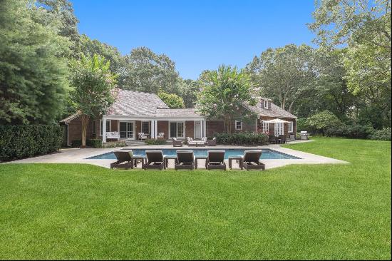 New extensive renovation, this gated traditional is tucked away on two very private and qu