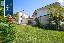 Luxury villa with pool and panoramic views of rows of vines