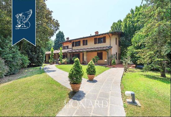 Elegant estate for sale with vast agricultural grounds in Lombardy