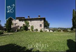 Stunning farmstead surrounded by Umbria's countryside for sale