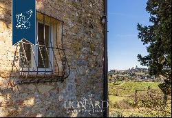 Elegant farmstead with panoramic view for sale in San Gimignano