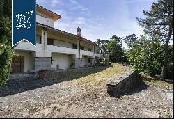 Luxury villa with tennis court for sale in Loro Ciuffenna