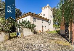 Luxury villa with small castle and olive grove for sale near Florence