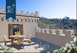 Luxury villa with small castle and olive grove for sale near Florence