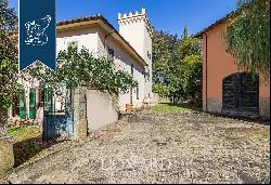 Luxury villa with small castle and olive grove for sale near Florence