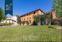 Luxury villa with small castle and olive grove for sale near Florence