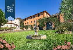 Luxury villa with small castle and olive grove for sale near Florence