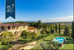 Farm with olive groves for sale near the Tuscan coast