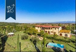 Farm with olive groves for sale near the Tuscan coast