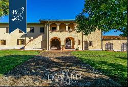 Farm with olive groves for sale near the Tuscan coast