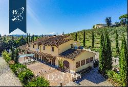 Farm with olive groves for sale near the Tuscan coast